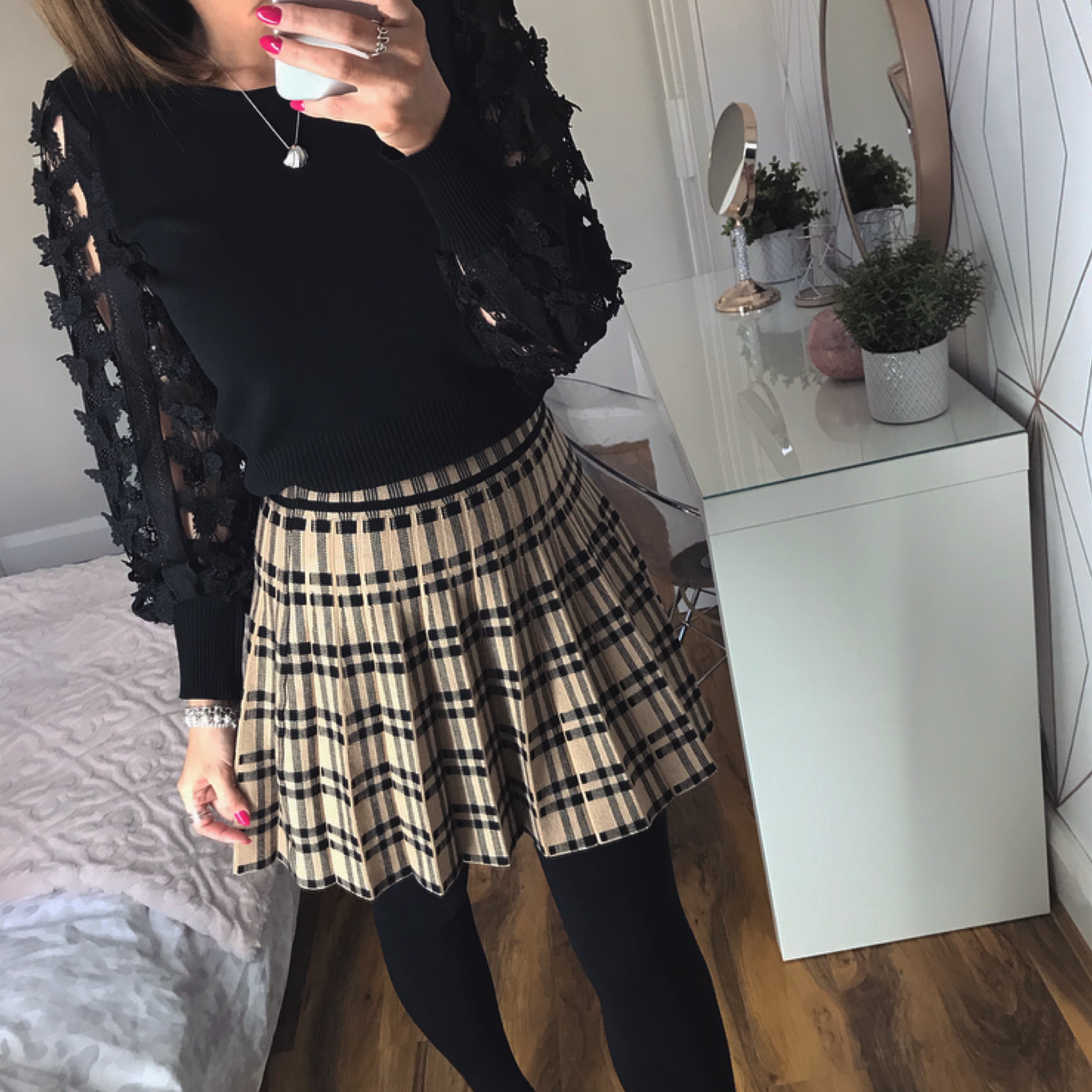 pleated mini skirt